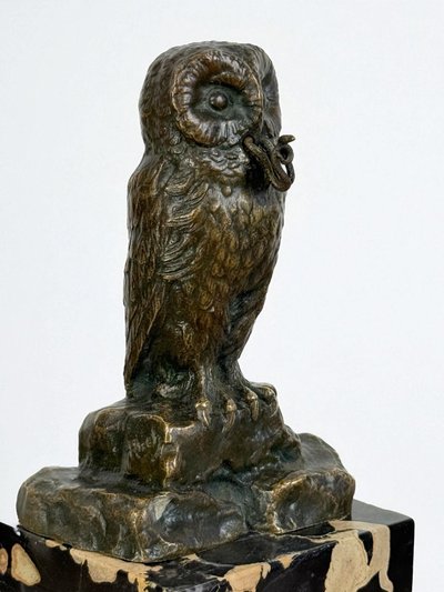 BRONZE WATCH HOLDER SIGNED H.RISCH DEPICTING AN OWL AND ITS SNAKE