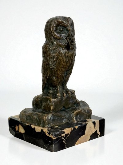 BRONZE WATCH HOLDER SIGNED H.RISCH DEPICTING AN OWL AND ITS SNAKE