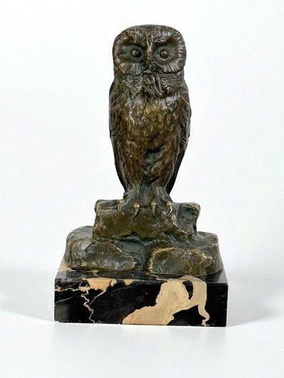 BRONZE WATCH HOLDER SIGNED H.RISCH DEPICTING AN OWL AND ITS SNAKE
