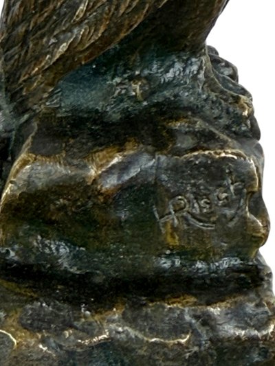 BRONZE WATCH HOLDER SIGNED H.RISCH DEPICTING AN OWL AND ITS SNAKE