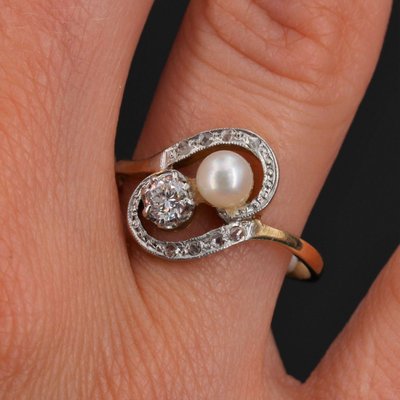 Anello antico con tourbillon e perla fine e diamanti
