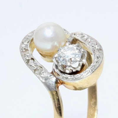 Anello antico con tourbillon e perla fine e diamanti