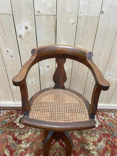 Fauteuil de coiffeur en cannnage Paul Tournay