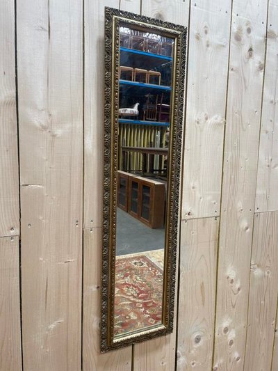 Piccolo specchio tra due in legno dorato