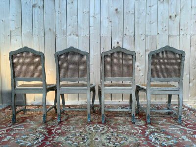 Suite de 4 chaises cannées de style Louis XV rechampi 