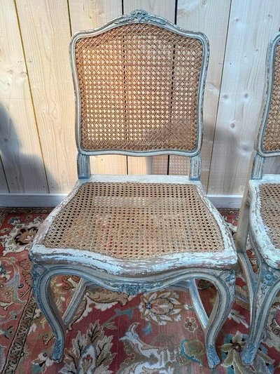 Suite de 4 chaises cannées de style Louis XV rechampi 