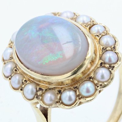 Anello in oro giallo con opale e perla