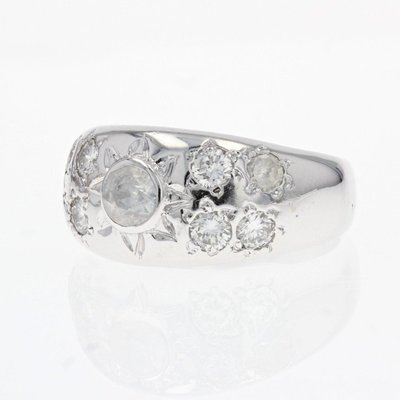 Anello rigido in oro bianco con diamanti