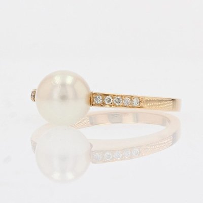 Anello piatto con perla e diamanti