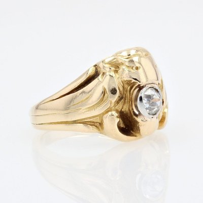 Anello antico in oro con leone e diamante