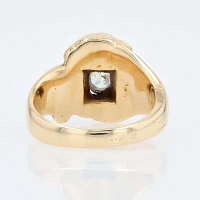 Anello antico in oro con leone e diamante