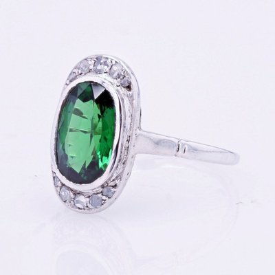 Anello antico con granato tsavorite e diamanti in rosa