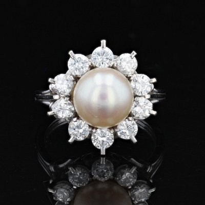 Anello antico con fiocco di neve e diamanti
