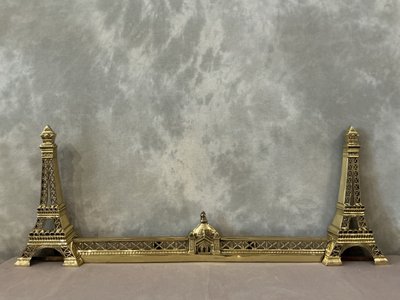 Barre de foyer, barre de cheminée en bronze décor de Tour Eiffel vers 1900