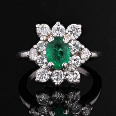 Anello vintage con smeraldo e diamanti