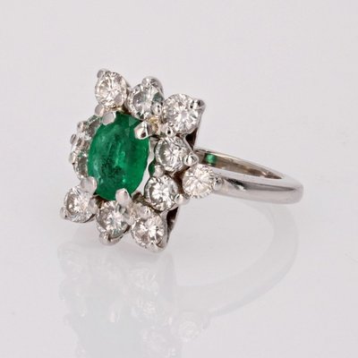 Anello vintage con smeraldo e diamanti