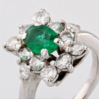 Anello vintage con smeraldo e diamanti