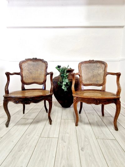 Antique French rattan armchairs from the Louis XVI period