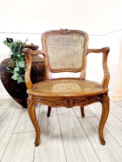 Antique French rattan armchairs from the Louis XVI period
