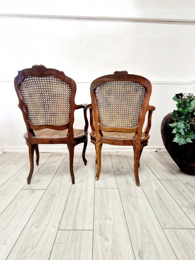 Antique French rattan armchairs from the Louis XVI period