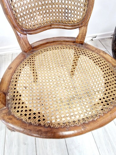 Antique French rattan armchairs from the Louis XVI period