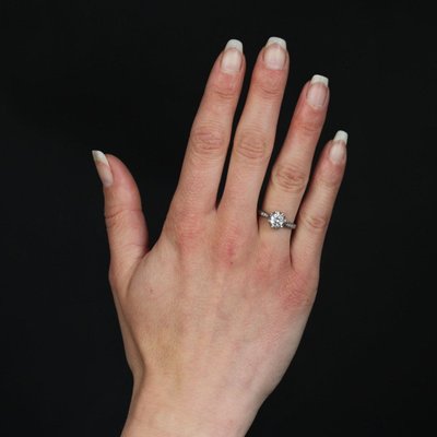 Anello solitario con diamante antico