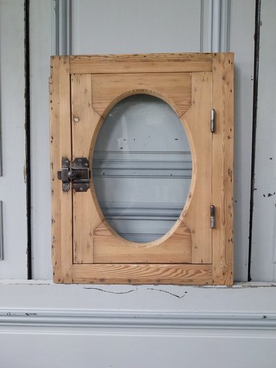 old bull's eye oval window