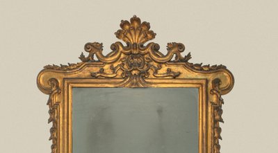 Carved and gilded wooden mirror, 19th century