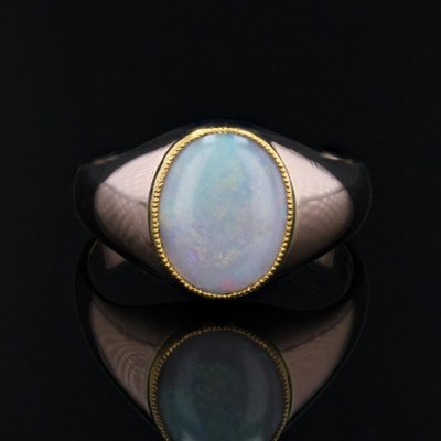 Anello in oro rosa con opale
