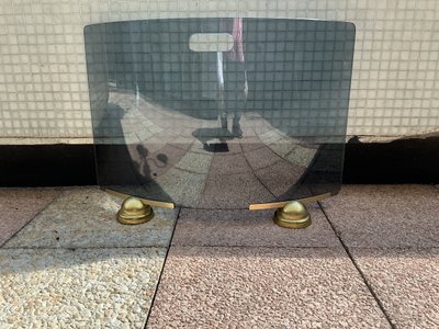 Modernist smoked and curved glass firewall circa 1970