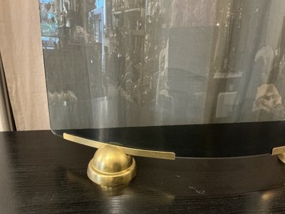 Modernist smoked and curved glass firewall circa 1970