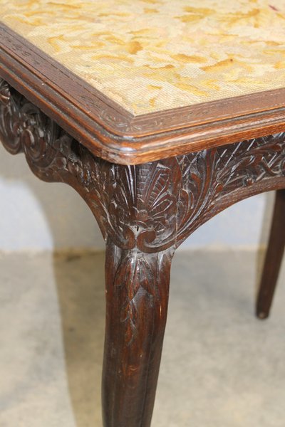 Louis XV style living room table in carved oak with tapestry top and 1 drawer, 19th century