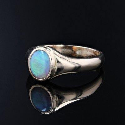 Armreif mit Opal aus Gelbgold