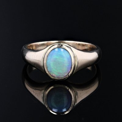 Armreif mit Opal aus Gelbgold