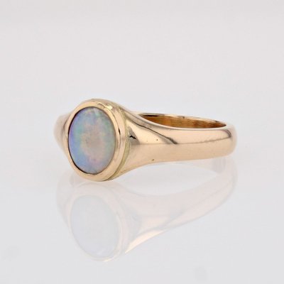 Armreif mit Opal aus Gelbgold