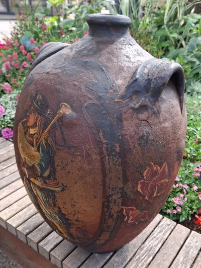 Breton folk art bagpipe player