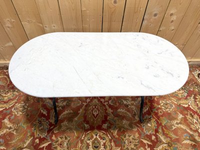 Oval marble and cast iron bistro table