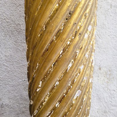 Pair of gilded and carved wood columns, 17th century