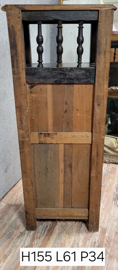 Breton bonnetière in solid carved oak, 19th century, circa 1850