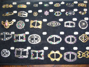 Box of decorative buckles from the early 20th century