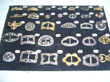 Box of decorative buckles from the early 20th century