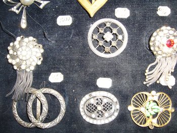 Box of decorative buckles from the early 20th century