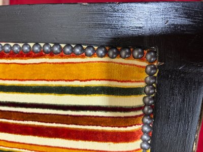 Art deco armchair in multicolored striped fabric