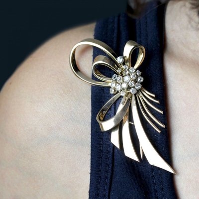 Spilla a fiocco vintage in oro rosa e diamanti