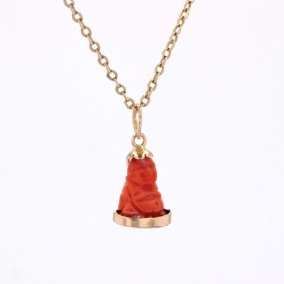 Breloque Bouddha corail et or