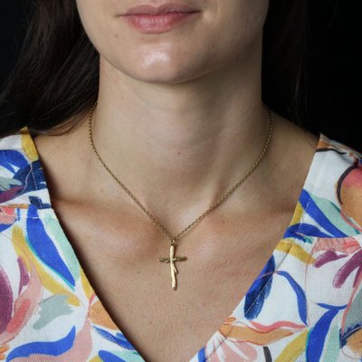 Croix or jaune texturé végétal