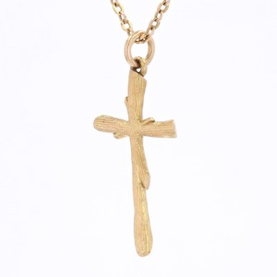 Croix or jaune texturé végétal