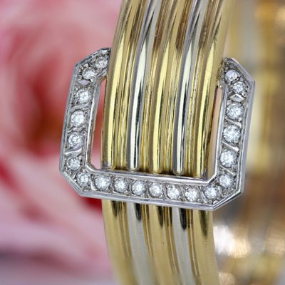 Bracelet jonc deux ors et sa boucle diamants