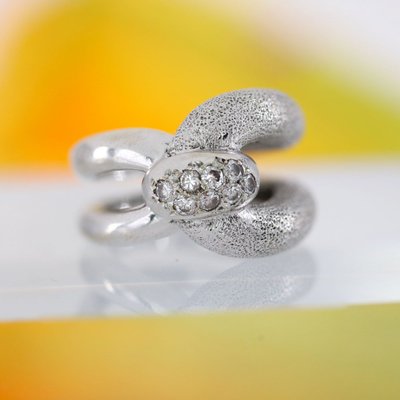 Bague or blanc diamants agrafe