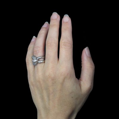Bague or blanc diamants agrafe